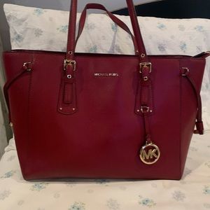 Michael Kors purse and wrislet